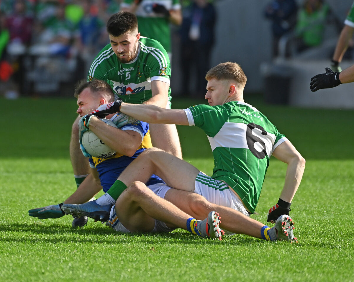 Kilshannig's Conor McMahon is tackled by Aghabullogue's Billy Casey and Paul Ring during the 2022 IAFC final at Páirc Uí Chaoimh. Picture: Eddie O'Hare Kilshannig's Conor McMahon is tackled by Aghabullogue's Billy Casey and Paul Ring during the 2022 IAFC final at Páirc Uí Chaoimh. Picture: Eddie O'Hare