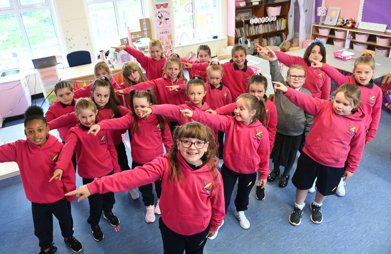  Molly O'Keeffe and second class classmates dance in the classroom upon returning to Togher Girls National School on Wednesday. Pic Larry Cummins
