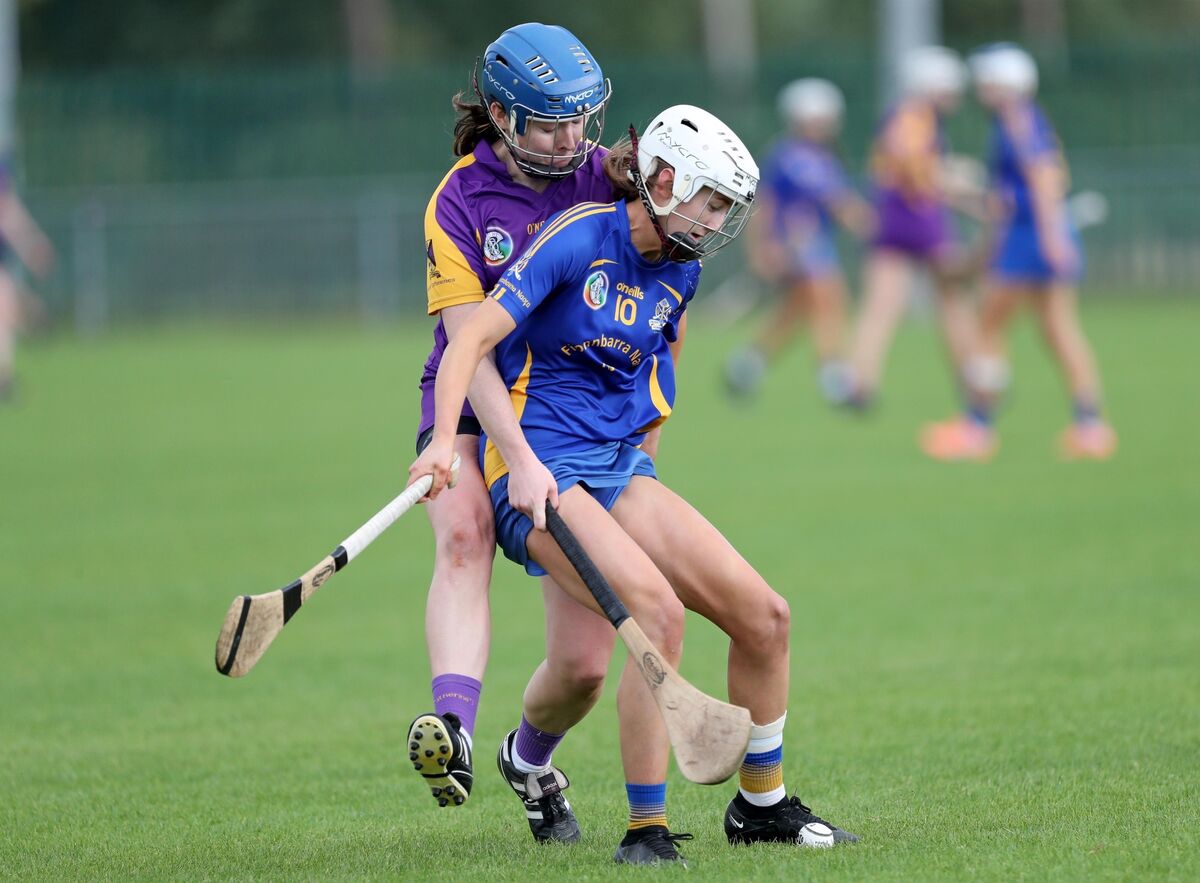 Rachel O'Callaghan, St Catherine's, tackles Nicole Olden, St. Finbarr's, at Castle Road. Picture: Jim Coughlan. Rachel O'Callaghan, St Catherine's, tackles Nicole Olden, St. Finbarr's, at Castle Road. Picture: Jim Coughlan.