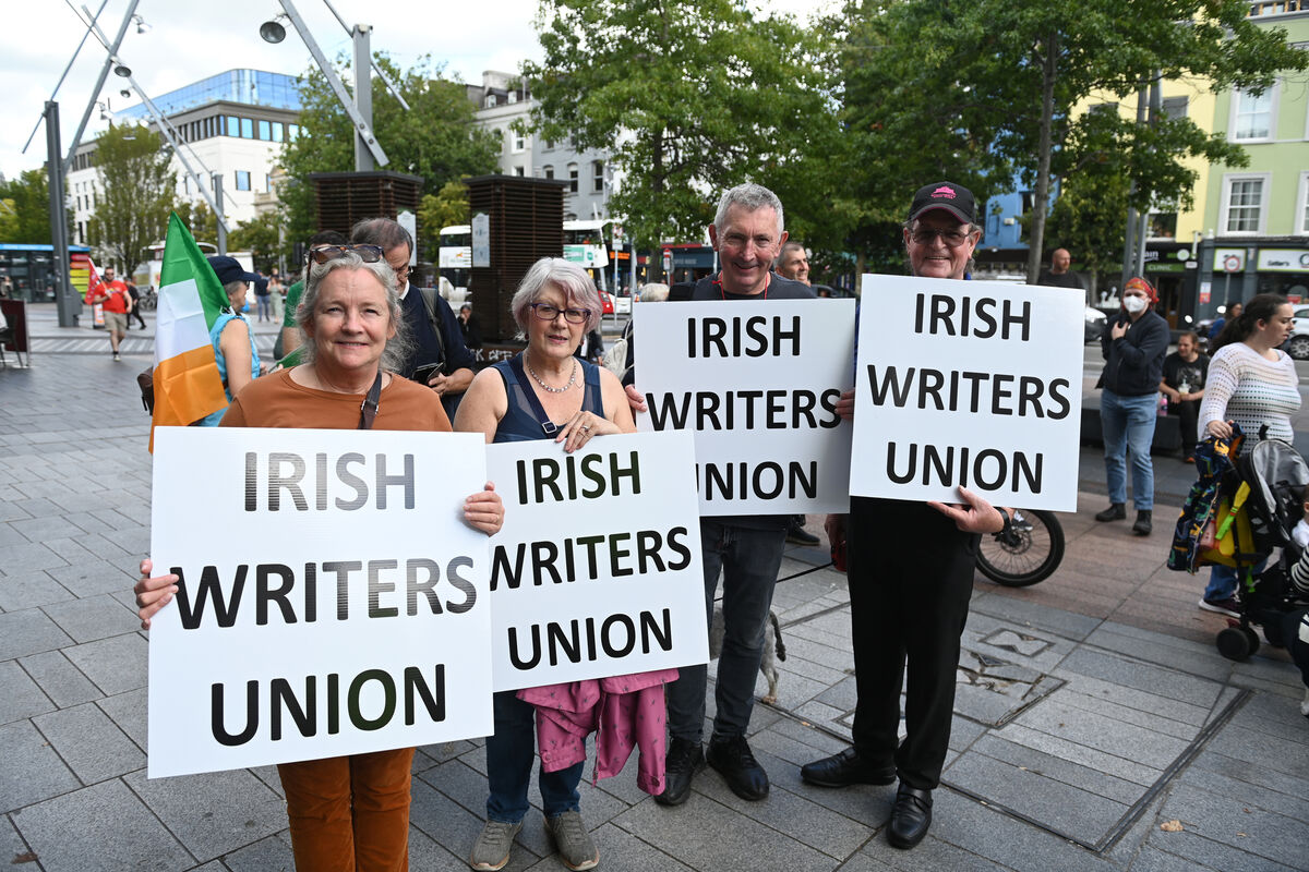 Members of the Irish Writers Union attending a counter-protest organised by Cork Rebels for Peace in solidarity with library staff, outside the Cork City Library, in opposition to the 'Cork Says NO' protest rally against refugees and trans-rights. Pic Larry Cummins Members of the Irish Writers Union attending a counter-protest organised by Cork Rebels for Peace in solidarity with library staff, outside the Cork City Library, in opposition to the 'Cork Says NO' protest rally against refugees and trans-rights. Pic Larry Cummins
