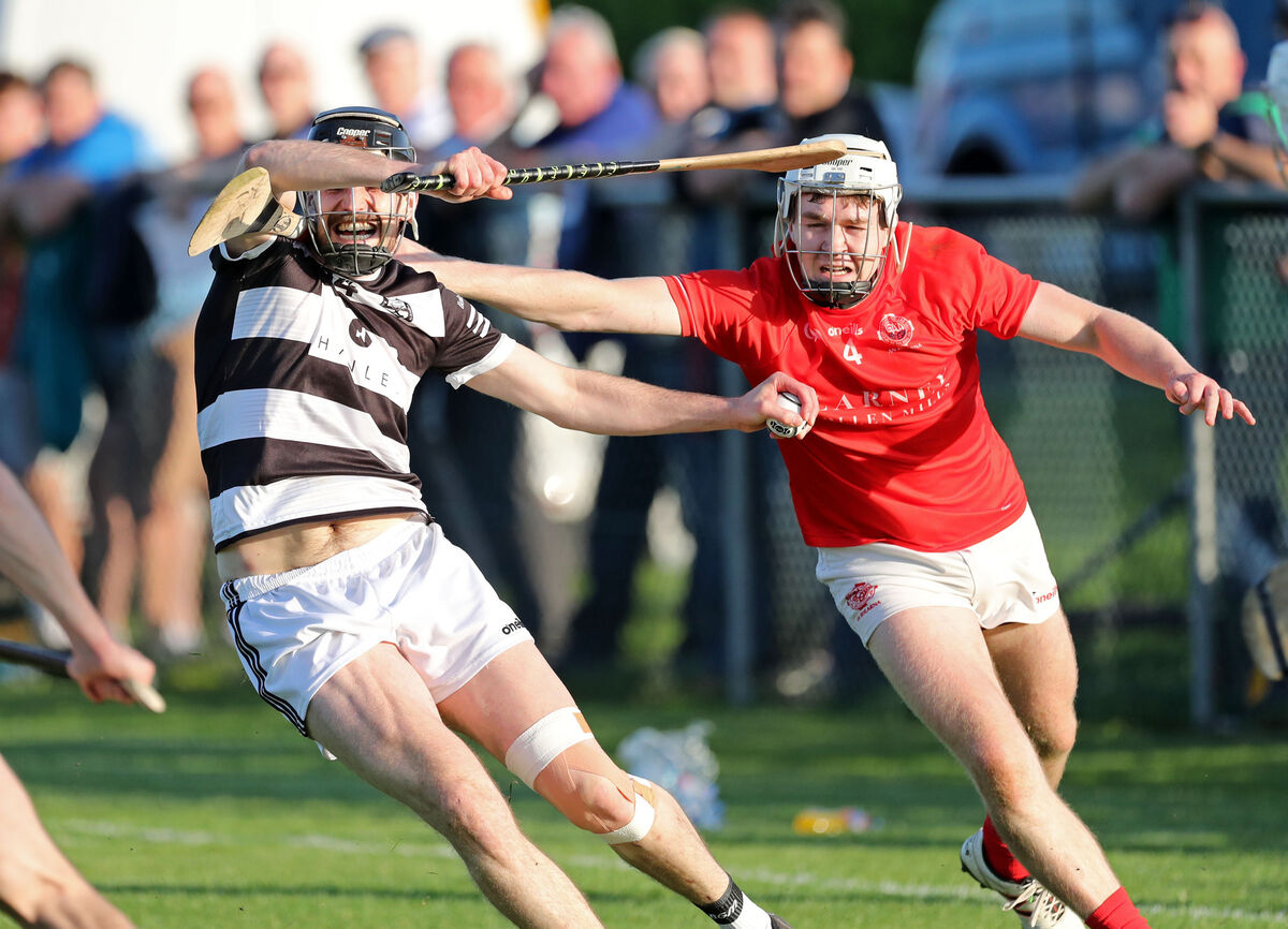 John Morrissey, Ballyhea, tries to shake off Darragh Murphy, Blarney. Picture: Jim Coughlan. John Morrissey, Ballyhea, tries to shake off Darragh Murphy, Blarney. Picture: Jim Coughlan.