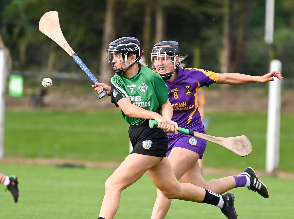Killeagh's Laura Treacy clears her lines as St Catherine’s Eimear O'Brien closes in, during their SE Systems Senior Camogie Championship clash at Rostellan. Killeagh's Laura Treacy clears her lines as St Catherine’s Eimear O'Brien closes in, during their SE Systems Senior Camogie Championship clash at Rostellan.