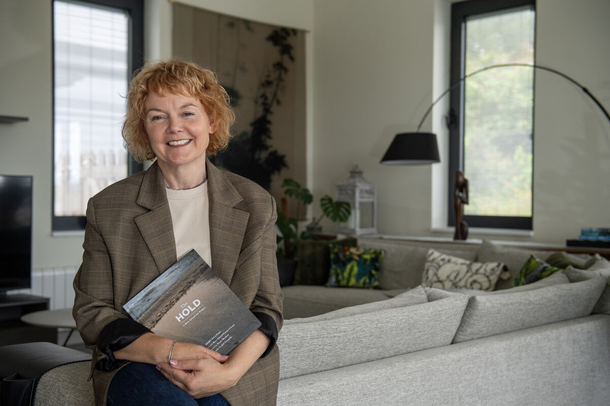 Mary K Sullivan with the book, The Hold, which is a Bere Island Art Project in collaboration wit Bere Island Women Create. Picture Dan Linehan