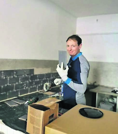 Vasilijus hard at work refurbishing the café. Vasilijus hard at work refurbishing the café.