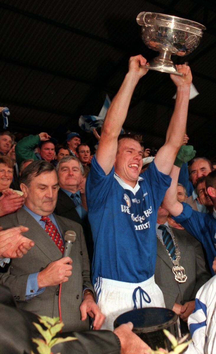 BANTRY BLUES v DUHALLOW. TSB CORK COUNTY SENIOR FOOTBALL CHAMPIONSHIP FINAL. Bantry Captain Damien O'Neill holding the trophy aloft after his side defeated Duhallow in the County Football Championship final at Pairc Ui Chaoimh. Picture Dan LInehan