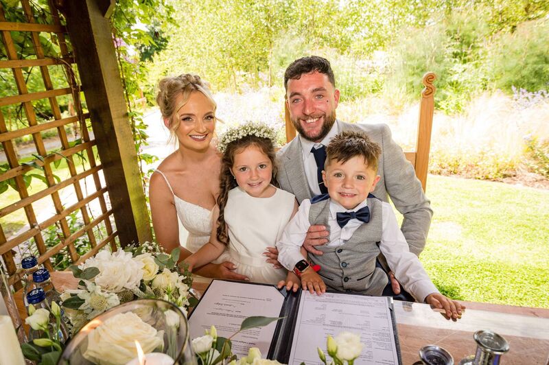 The couple with their daughter Harper and son Jayce.