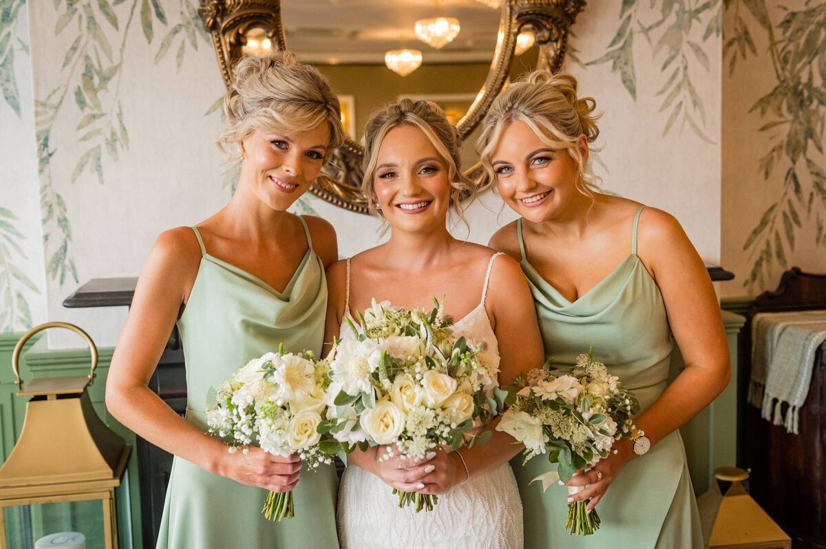 The bride with bridesmaids, Lucy Gleeson and Tara Cadogan. The bride with bridesmaids, Lucy Gleeson and Tara Cadogan.