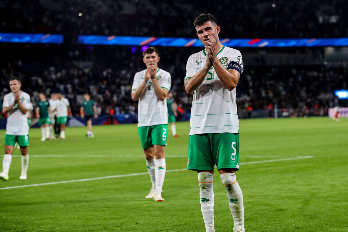 Ireland's John Egan applauds the Irish fans.