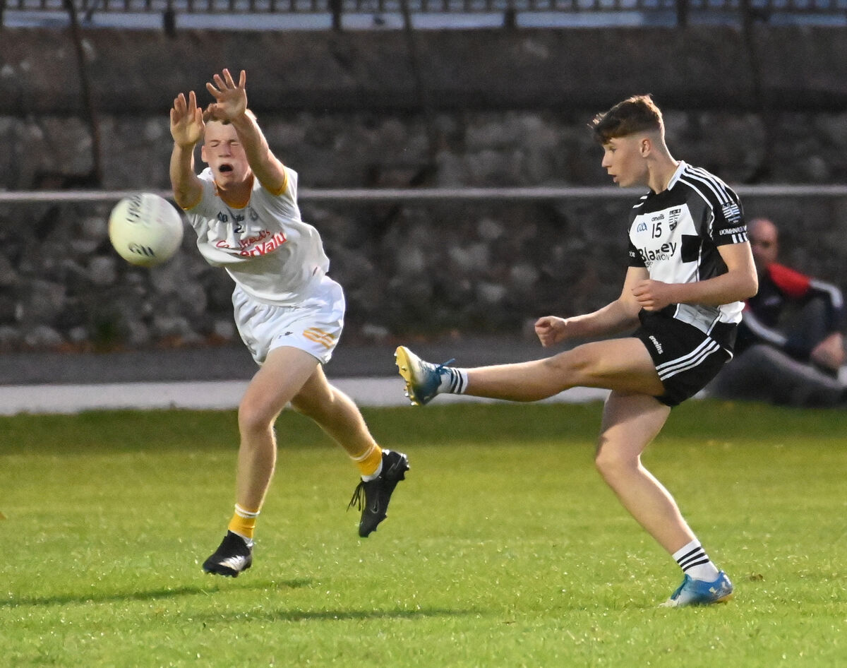 Donoughmore's Scott Barrett shoots past Bandon's Richie Tarrant. Picture: Eddie O'Hare Donoughmore's Scott Barrett shoots past Bandon's Richie Tarrant. Picture: Eddie O'Hare