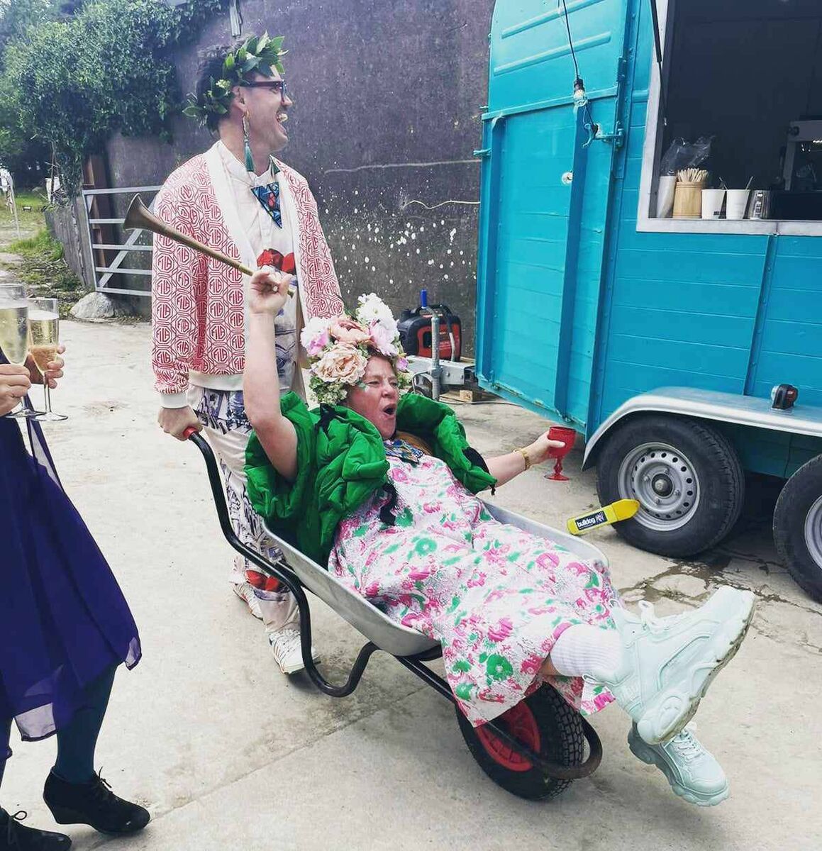 Noelle O’Regan enjoys spin in a wheelbarrow from her new husband Cormac Mohally during their wedding last month Noelle O’Regan enjoys spin in a wheelbarrow from her new husband Cormac Mohally during their wedding last month