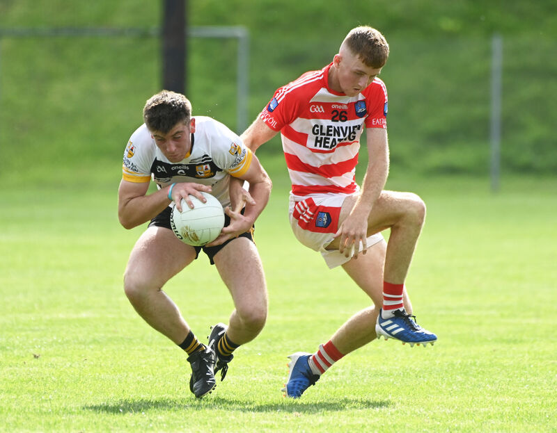 Glenville's Mike O'Driscoill wins the ball from Adrigole's Neil O'Sullivan during IAFC at Carrigadrohid. Picture: Eddie O'Hare