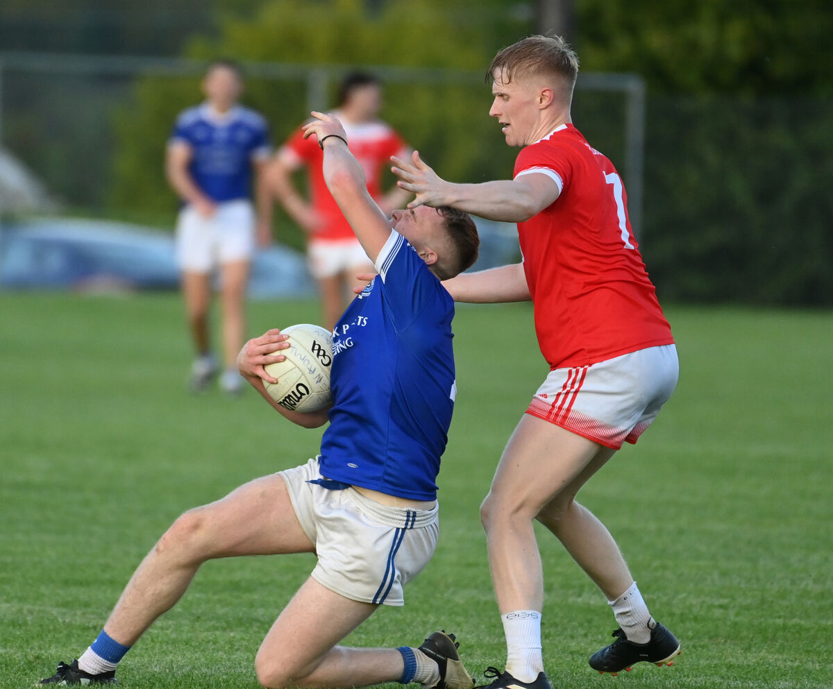 Naomh Abán's Colm de Róiste is fouled by Iveleary's Timmy Roberts during the PIFC at Carrigadrohid. Picture: Eddie O'Hare