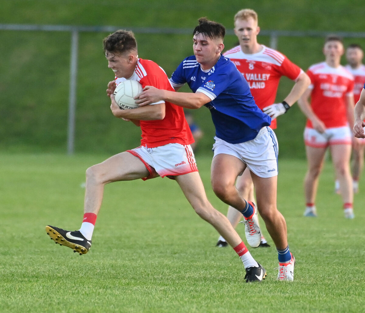 Iveleary's Brian O'Riordan is tackled by Naomh Abán's Jack O'Donnchú during the PIFC at Carrigadrohid. Picture: Eddie O'Hare