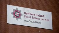 Three treated in hospital after arson attack at block of flats