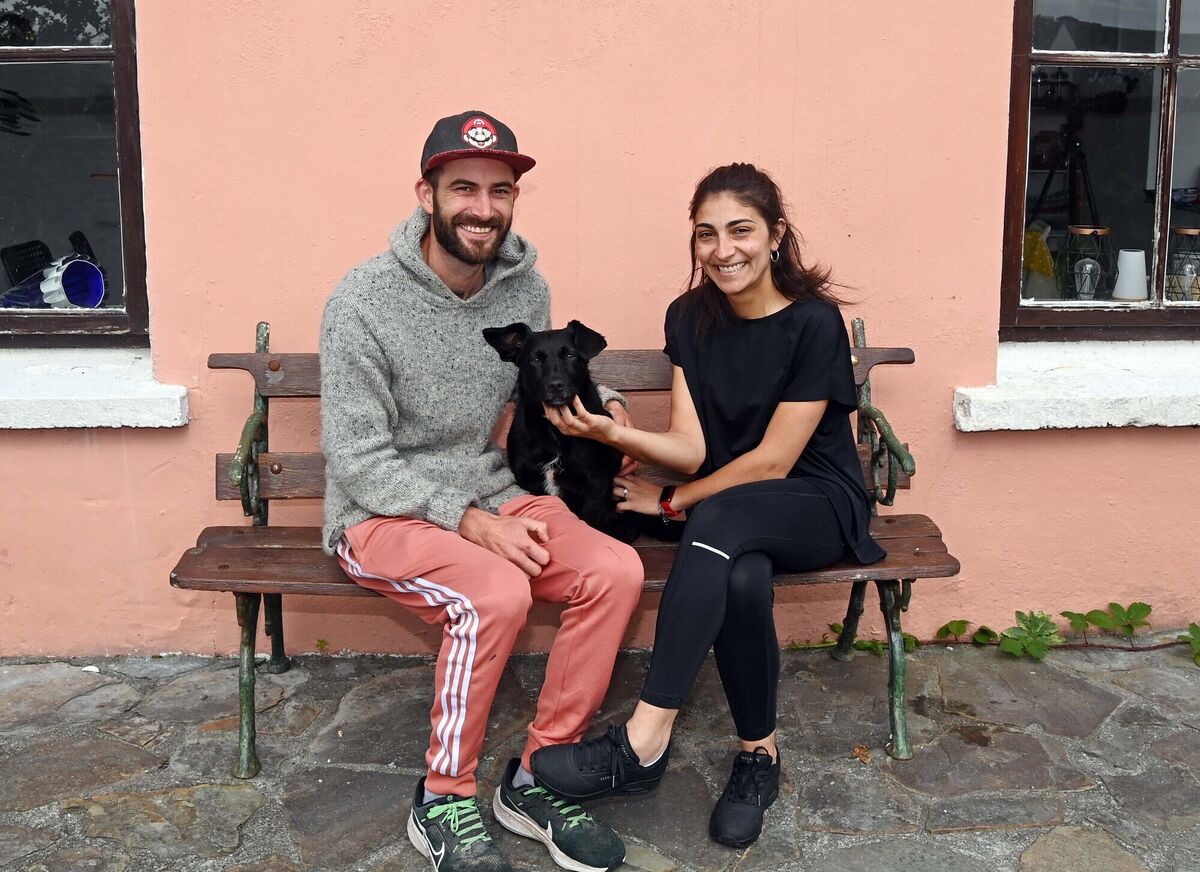 Claudia Meloni and her fiancé Craig Moore with their dog Millie on Heir Island in West Cork. Picture Denis Minihane. Claudia Meloni and her fiancé Craig Moore with their dog Millie on Heir Island in West Cork. Picture Denis Minihane.