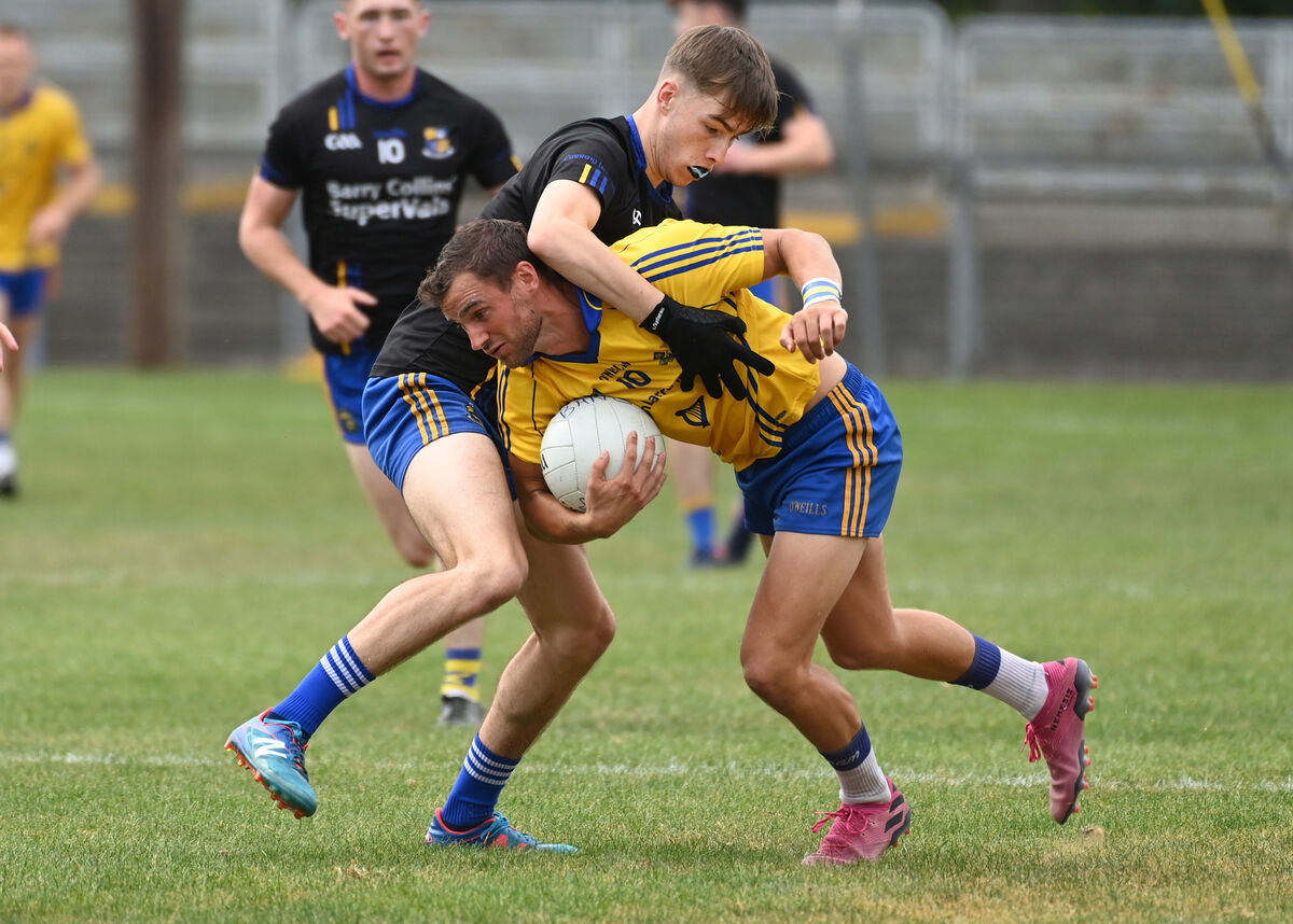 St Finbarrs's Enda Dennehy is tackled by Carrigaline's Nathan O'Keeffe during Premier SFC at Páirc Uí Rinn last season. Picture: Eddie O'Hare