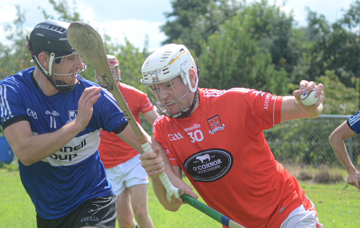 Mayfield's Eoin O'Sullivan keeps the sliothar away from the challenge from Sarsfields' Aidan Hackett during the Co-op SuperStores IAHC game at Carraig na bhFear. Picture: Howard Crowdy Mayfield's Eoin O'Sullivan keeps the sliothar away from the challenge from Sarsfields' Aidan Hackett during the Co-op SuperStores IAHC game at Carraig na bhFear. Picture: Howard Crowdy