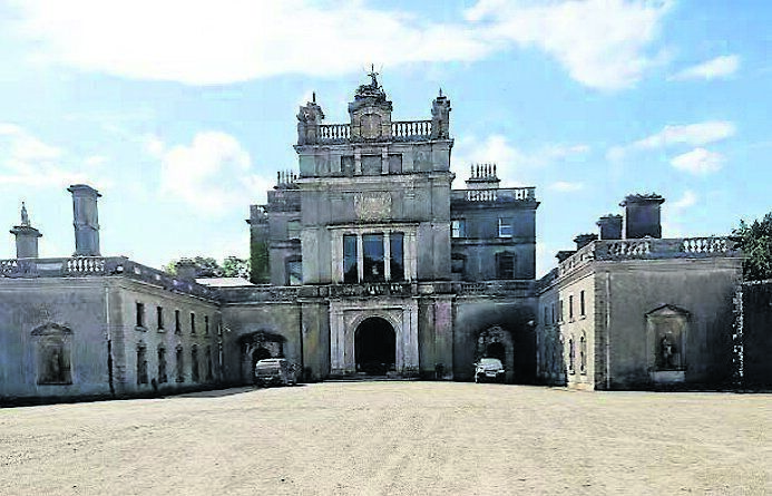 The imposing entrance to Curraghmore House from the courtyard side. The imposing entrance to Curraghmore House from the courtyard side.
