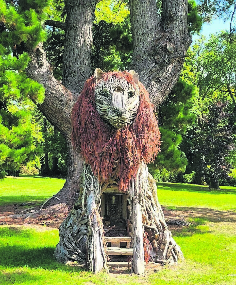 ABOVE: A timber lion sculpture incorporated in part of the gardens hosting the All Together Now festival on the Curraghmore estate. The mane is made from cryptomeria foliage. ABOVE: A timber lion sculpture incorporated in part of the gardens hosting the All Together Now festival on the Curraghmore estate. The mane is made from cryptomeria foliage.