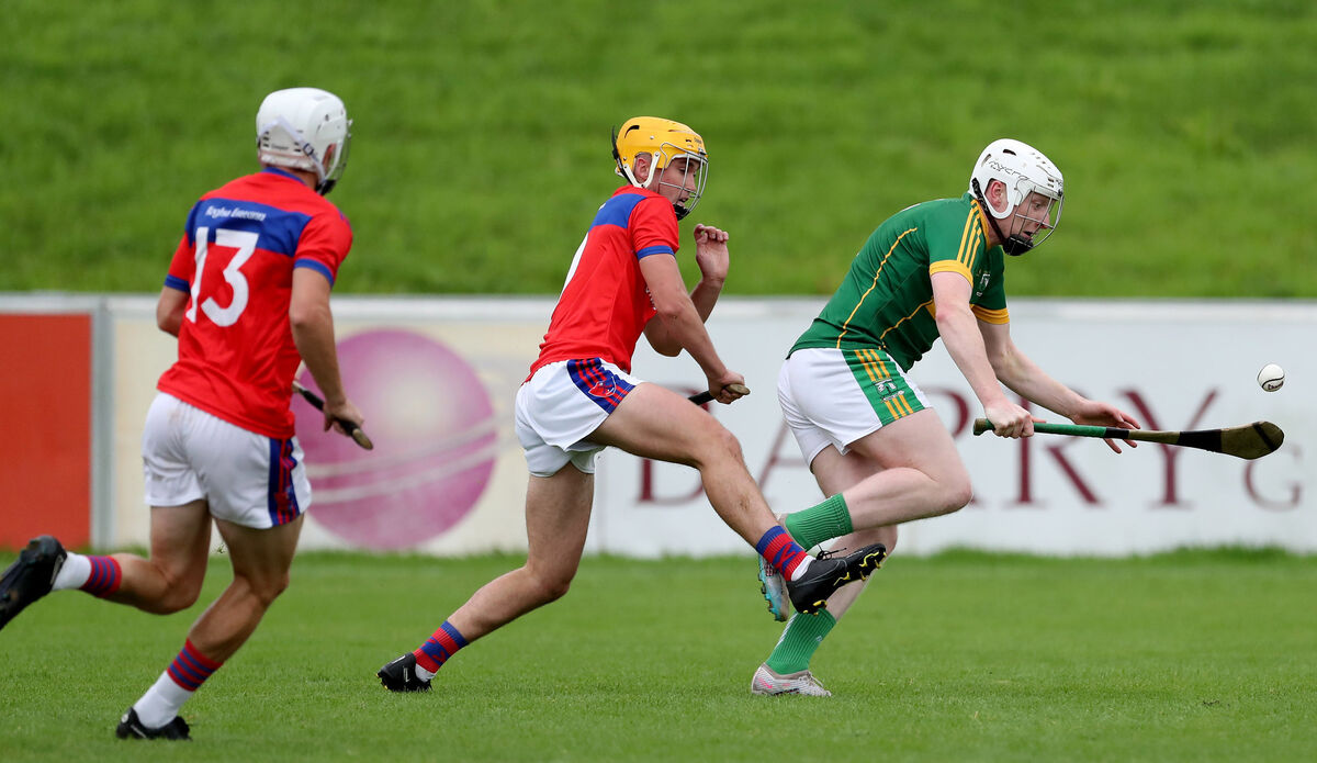  William Murphy, Meelin, takes on John Kavanagh and Andrew O'Sullivan, Erin's Own. Picture: Jim Coughlan.