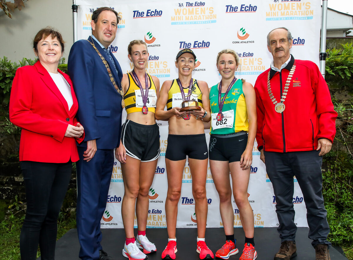 Grainne McGuinness, Editor Echo, Lord Mayor of Cork, Cllr. Kieran McCarthy, Lizzie Lee, winner, Hannah Steeds, runner up, Amy Pollmann, third place and Pat Walsh, AAI at the presentation to the winner of the 42nd Echo Cork Women's Mini-Marathon in Cork City. Picture: David Creedon