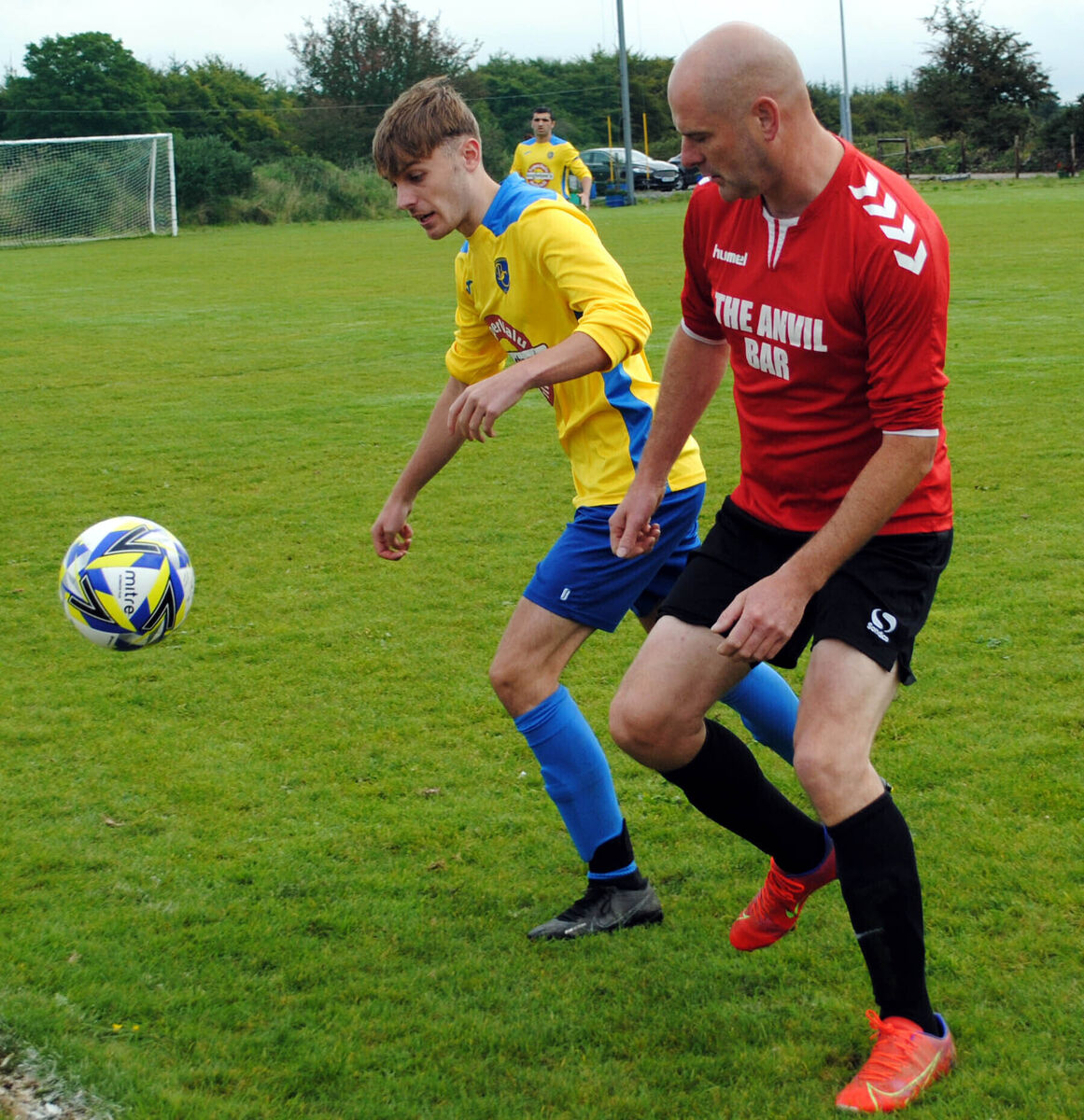 Bweeng Celtic's Andrew Braken and Rylane Celtic's Matt Leary clash for possession.