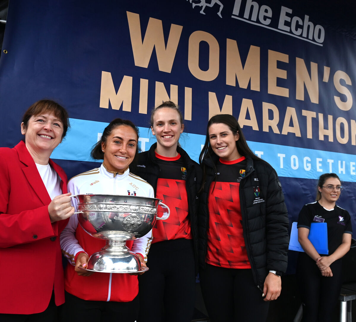  Grainne McGuinness, Editor, The Echo with All-Ireland Camogie winners Amy O'Connor (captain) and players Aisling Egan and Molly Lynch at the start of The Echo Women's Mini-Marathon at Kennedy Quay. Pic Larry Cummins