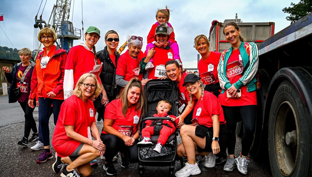 Sinead Crowley with Freya O’Riordan (2) on her shoulders and her brother Robbie O’Riordan (2) in his buggy, participated in the Echo Mini Marathon on behalf of Down Syndrome Ireland with friends and fellow family members. Sinead Crowley with Freya O’Riordan (2) on her shoulders and her brother Robbie O’Riordan (2) in his buggy, participated in the Echo Mini Marathon on behalf of Down Syndrome Ireland with friends and fellow family members.