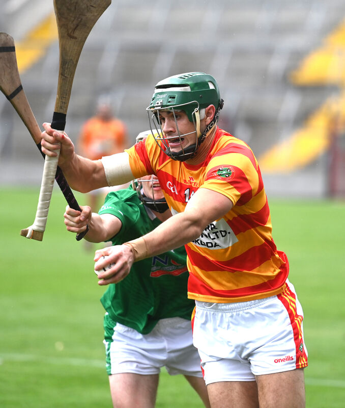 Sean O'Donovan battles to keep possession for Newcestown. Picture: Larry Cummins. Sean O'Donovan battles to keep possession for Newcestown. Picture: Larry Cummins.
