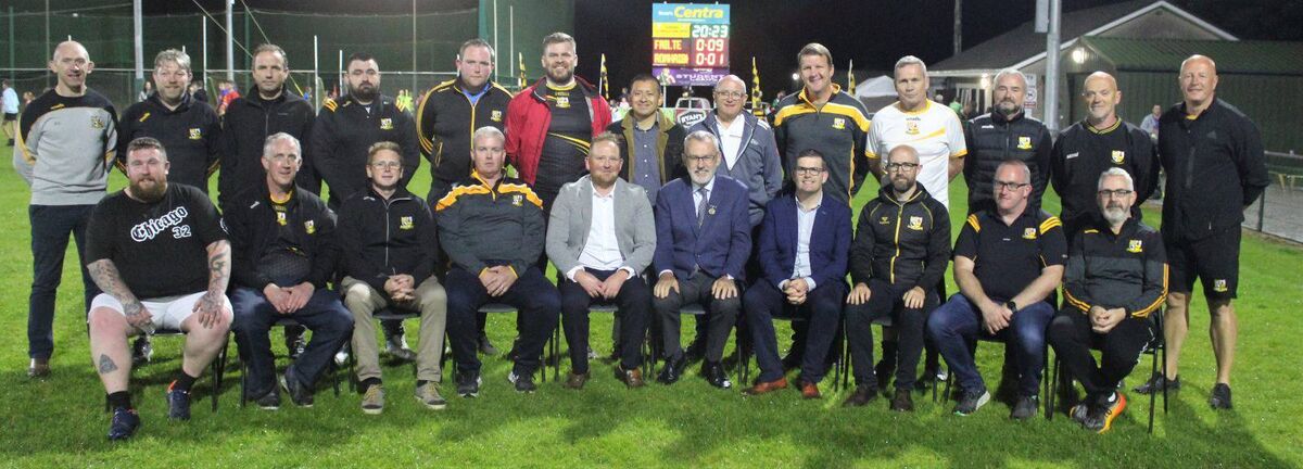 Members of the Glenville GAA Club executive with GAA President Larry McCarthy.