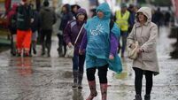Crowds brave wet and windy weather at National Ploughing Championships