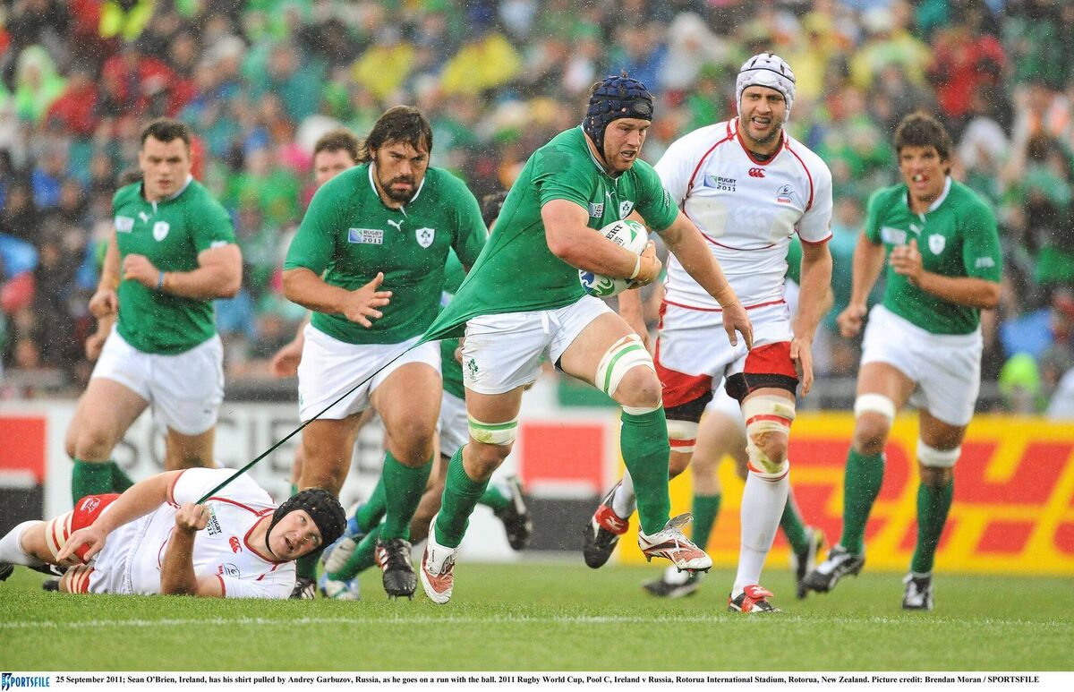 Sean O'Brien, Ireland, has his shirt pulled by Andrey Garbuzov, Russia, as he goes on a run with the ball. 2011 Rugby World Cup, Pool C, Ireland v Russia, Rotorua International Stadium, Rotorua, New Zealand. Picture credit: Brendan Moran / SPORTSFILE