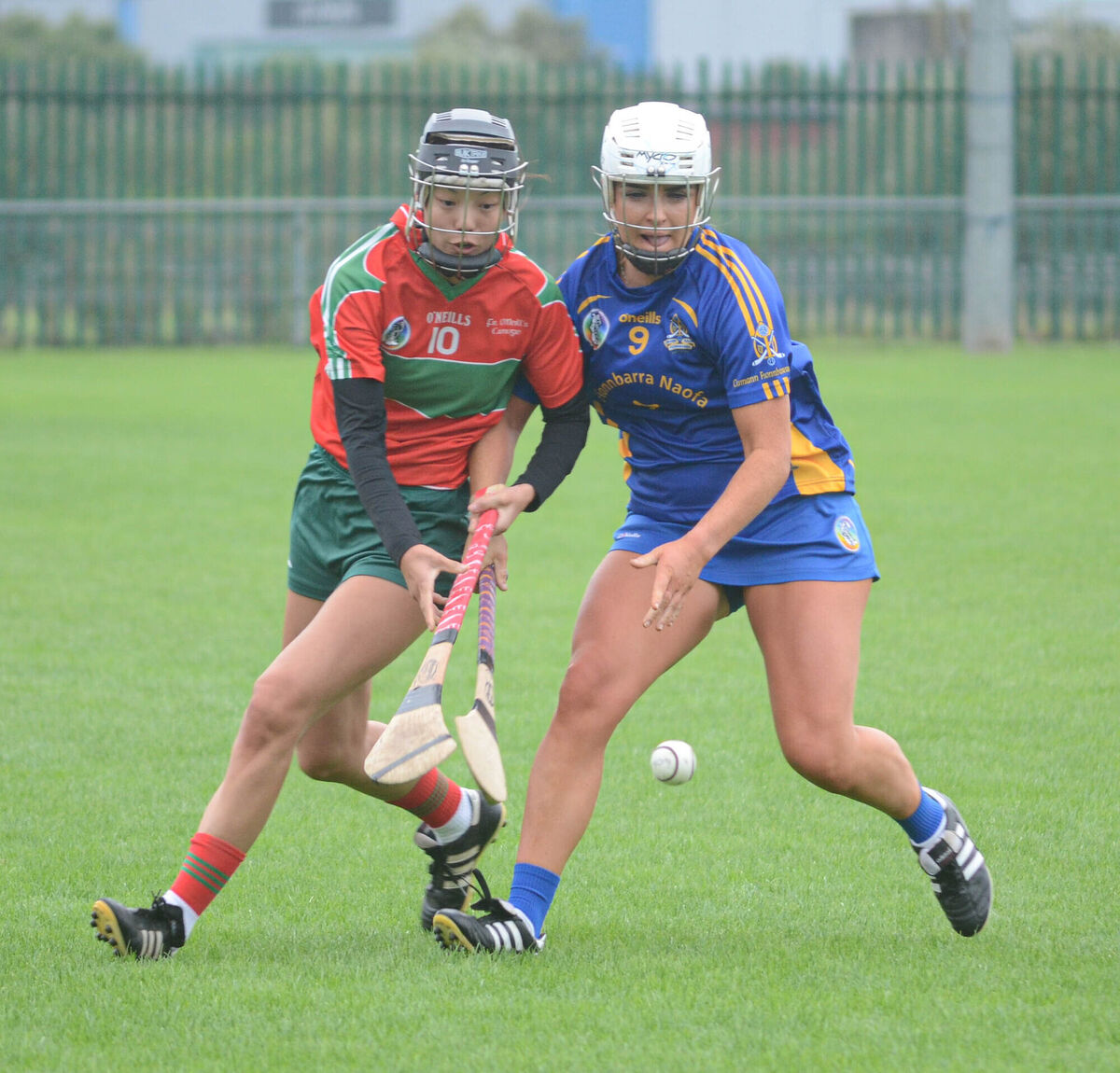 Fr O'Neill's Kayla O'Riordan and St Finbarr's Aisling Shannon keep their eyes on a loose ball during the SE Systems Senior Camogie Championship match at Castle Road. Picture: Howard Crowdy Fr O'Neill's Kayla O'Riordan and St Finbarr's Aisling Shannon keep their eyes on a loose ball during the SE Systems Senior Camogie Championship match at Castle Road. Picture: Howard Crowdy