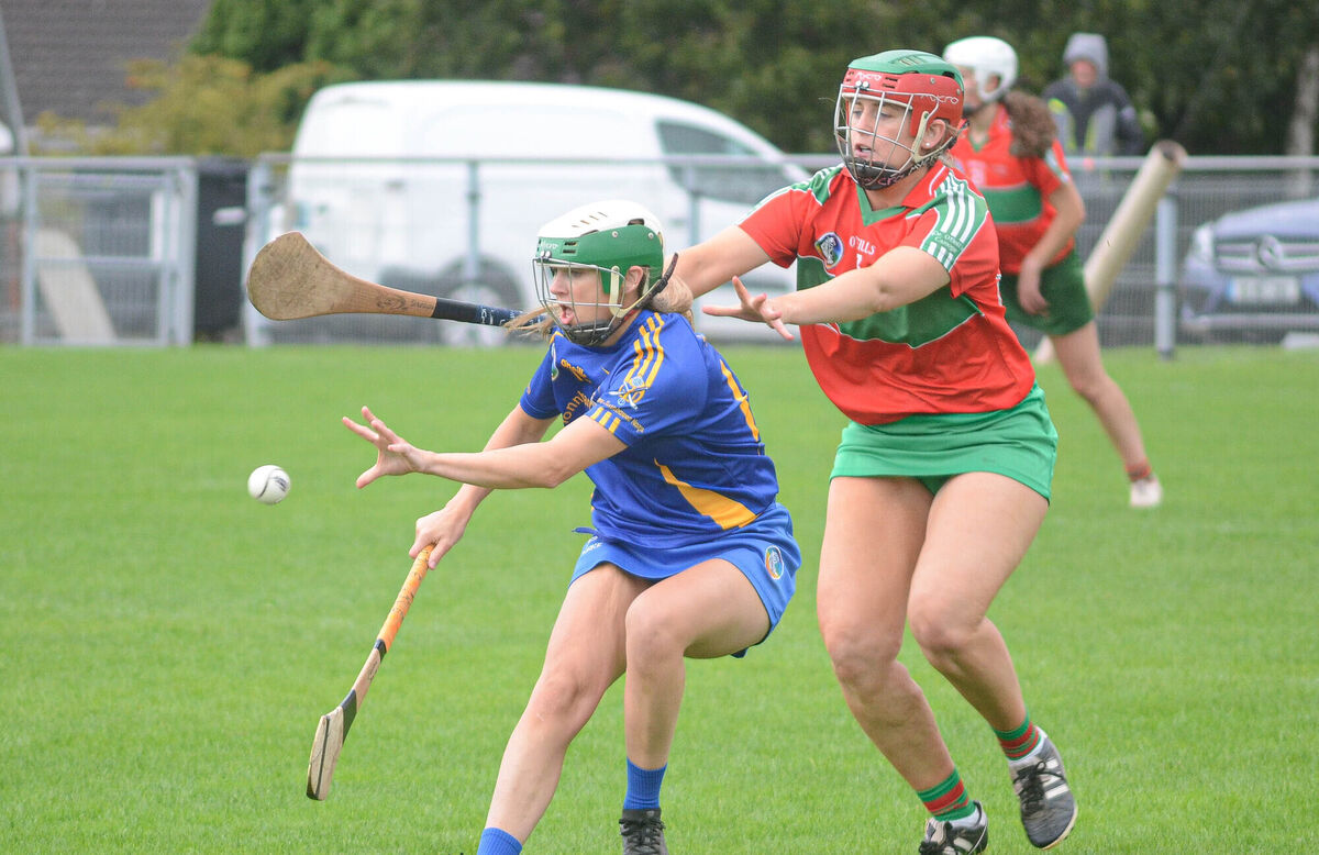 Caroline Sugrue of St Finbarr's about to catch the sliothar despite the attention from Fr O'Neill's Sharon Murphy during the SE Systems Senior Camogie Championship match at Castle Road. Picture: Howard Crowdy Caroline Sugrue of St Finbarr's about to catch the sliothar despite the attention from Fr O'Neill's Sharon Murphy during the SE Systems Senior Camogie Championship match at Castle Road. Picture: Howard Crowdy