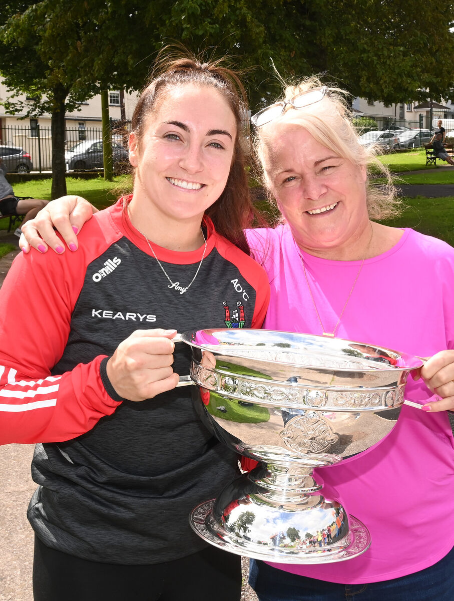  Camogie star Amy O'Connor with her mum Tracy holding the O'Duffy Cup.  