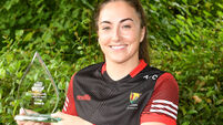 Amy 3-7 relieved to lift the O'Duffy Cup