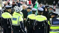 Gardaí escort TDs to safety amid demonstration outside Leinster House as Dáil resumes