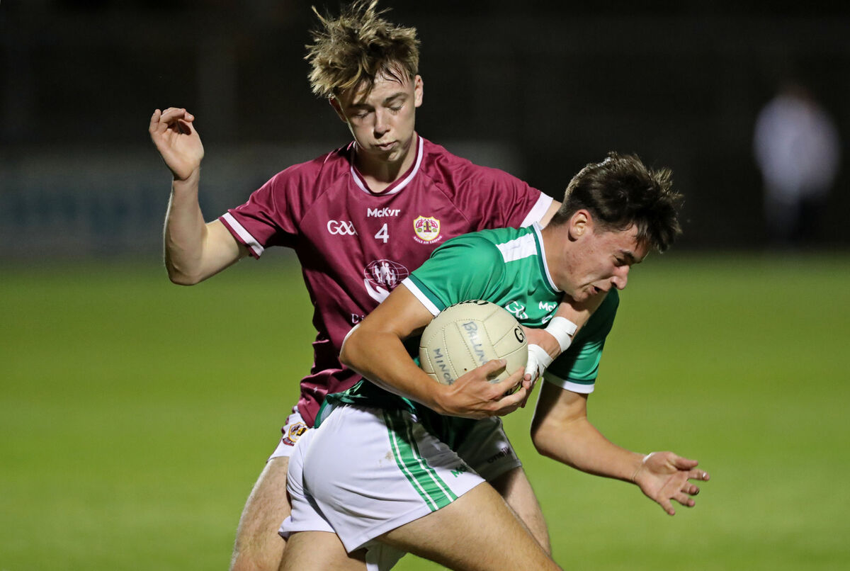  Cian O'Connor, Ballincollig, taking on Harry Wixted, Bishopstown. Picture: Jim Coughlan.