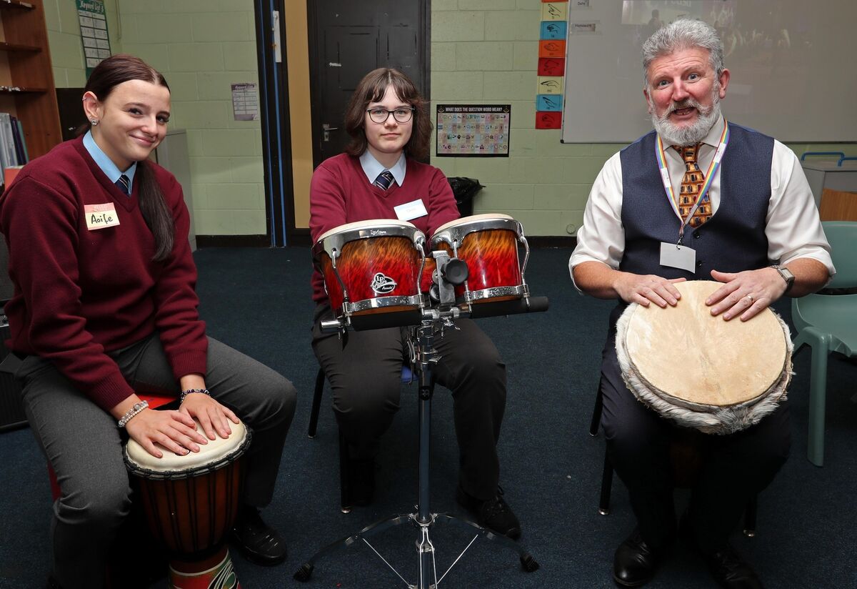  In the music class ready to meet possible new students for 2024 are Aoife Murphy Phelan, Theia Harris Murphy and music teacher, John Casey.