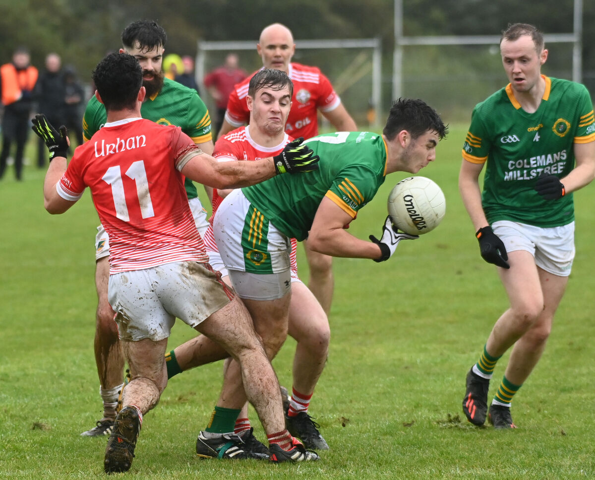 Millstreet's Eanna O'Mahony breaks from Urhan's Alan Elphick and Philip O'Shea. Picture: Eddie O'Hare Millstreet's Eanna O'Mahony breaks from Urhan's Alan Elphick and Philip O'Shea. Picture: Eddie O'Hare