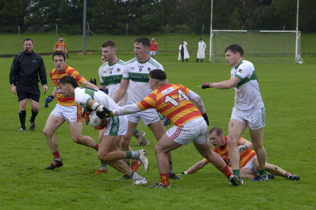 Newcestown's Edmund Kennelly tackling Kanturk's Alan Walsh. Picture: Denis Boyle Newcestown's Edmund Kennelly tackling Kanturk's Alan Walsh. Picture: Denis Boyle