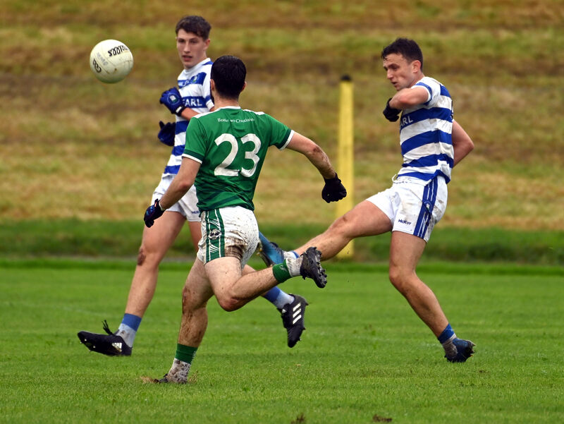 Castlehaven's Mark Collins shoots over a point from Ballincollig's Colin Moore. Picture: Eddie O'Hare