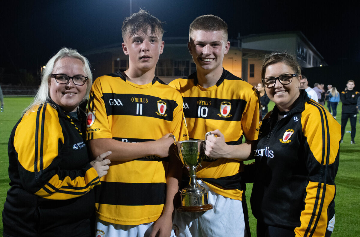 Noelle and Jamie Coughlan with Craig and Carissa O'Sullivan of Na Piarsaigh celebrate their Rebel Óg U15 Premier 1 win. Picture: Howard Crowdy Noelle and Jamie Coughlan with Craig and Carissa O'Sullivan of Na Piarsaigh celebrate their Rebel Óg U15 Premier 1 win. Picture: Howard Crowdy