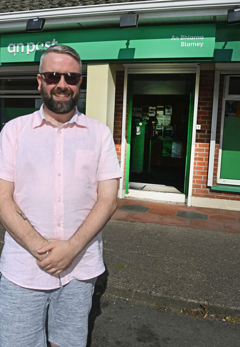 Daniel outside the post office. Daniel outside the post office.