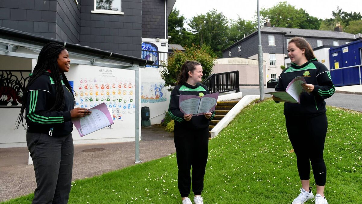 Muirin Abimbola, Maeve Ní Chróinín, and Eilis Ní Bhreacáin, students of Coláiste an Phiarsaigh, pictured in 2021 after sitting their Leaving Certificate French exams.