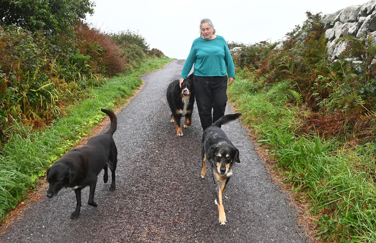 Fiona with her dogs Jasper, Basil, and Zebbiddee on Cape Clear. Picture; Eddie O'Hare Fiona with her dogs Jasper, Basil, and Zebbiddee on Cape Clear. Picture; Eddie O'Hare
