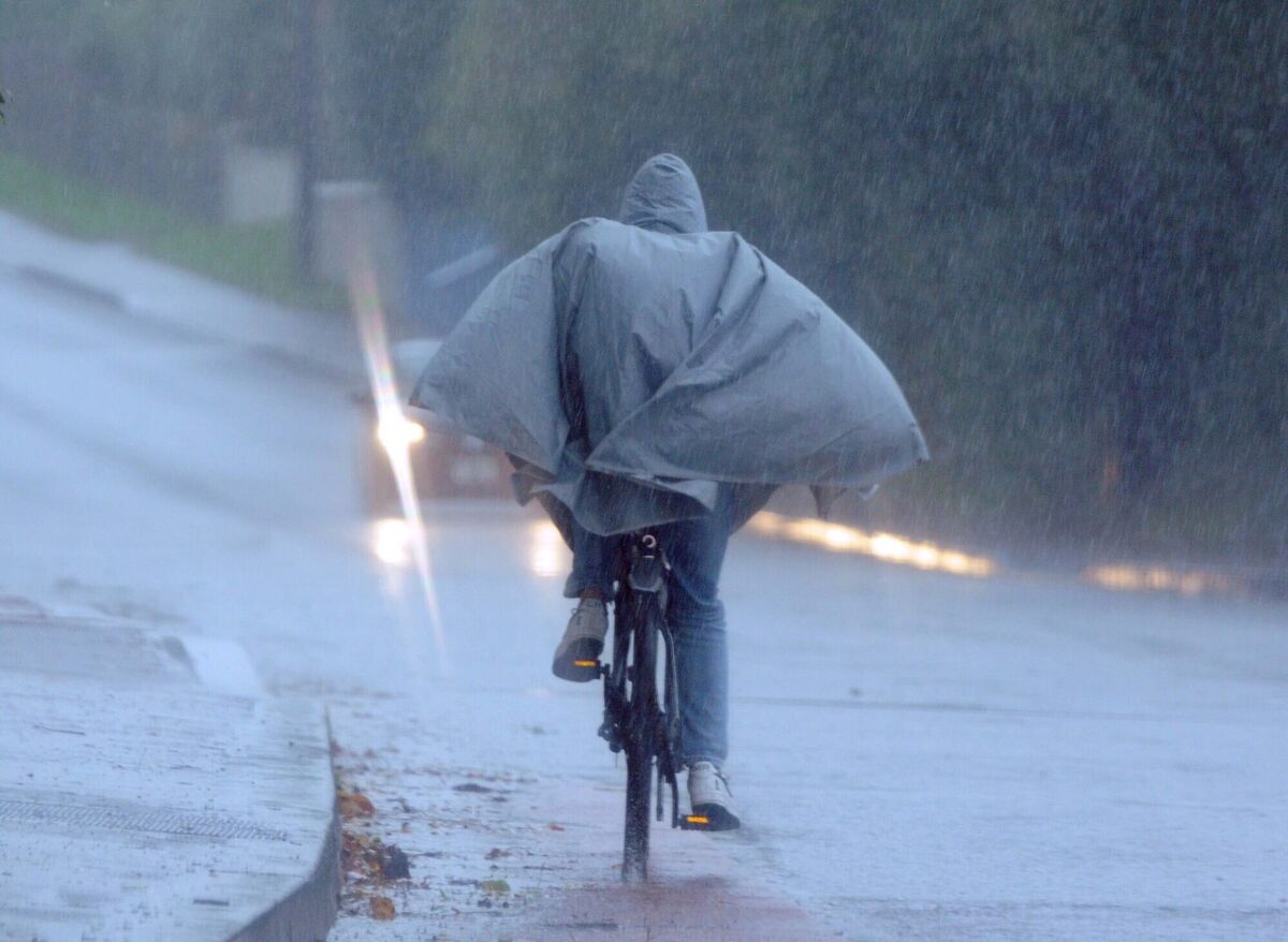 A cyclist braving the elements in Cork during Storm Agnes. Picture: Denis Minihane. A cyclist braving the elements in Cork during Storm Agnes. Picture: Denis Minihane.