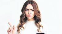 Young pretty woman refuse to drink alcohol holding glass of red wine