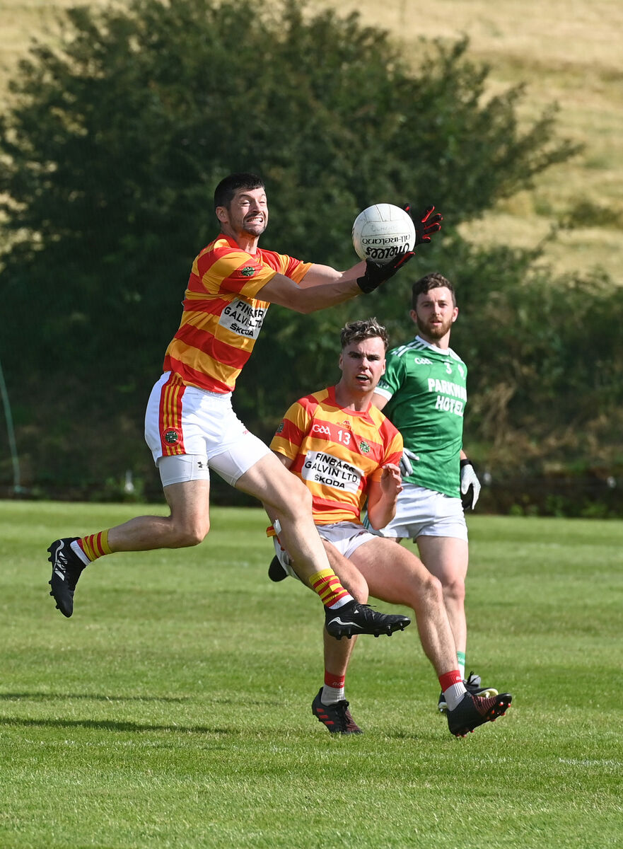 Tadhg Twomey wins possession in the air for Newcestown against Dohenys this season. Twomey was part of the 2001 panel that claimed the IFC title. Picture: Larry Cummins