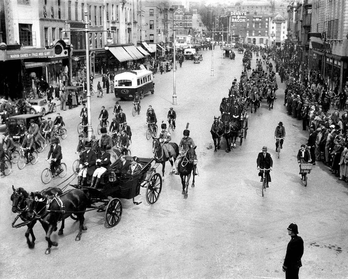 President de Valera travels by carraige through Cork to open the new City Hall in September, 1936.